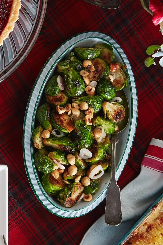 <p>Liven up your Brussels sprouts so that everyone will want a serving. The pickled shallots and toasted hazelnuts add the perfect tang and crunch to this classic side dish.</p><p><strong><a href="https://www.countryliving.com/food-drinks/a29626519/brussels-sprouts-with-pickled-shallots-and-hazelnuts-recipe/" rel="nofollow noopener" target="_blank" data-ylk="slk:Get the recipe;elm:context_link;itc:0;sec:content-canvas" class="link ">Get the recipe</a>.</strong></p><p><a class="link " href="https://www.amazon.com/Cuisinart-7117-16UR-Classic-Stainless-Rectangular/dp/B003YLJZ6M/ref=sr_1_4?tag=syn-yahoo-20&ascsubtag=%5Bartid%7C10050.g.34470406%5Bsrc%7Cyahoo-us" rel="nofollow noopener" target="_blank" data-ylk="slk:SHOP ROASTING PANS;elm:context_link;itc:0;sec:content-canvas">SHOP ROASTING PANS</a></p>