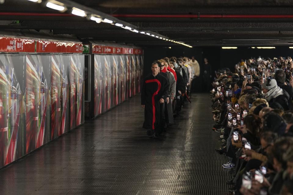 Models wear creations as part of the men's MSGM Fall-Winter 2024-2025 collection, that was presented in Milan, Italy, Saturday, Jan. 13, 2024. (AP Photo/Antonio Calanni).