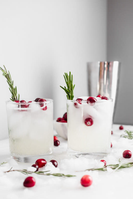 <p>Smells Like Home</p><p>A holiday drink with vodka, lemon juice and a rosemary simple syrup.</p><p><strong>Get The Recipe: <a href="http://www.smells-like-home.com/2018/11/the-mistletoe-kiss/" rel="nofollow noopener" target="_blank" data-ylk="slk:Mistletoe Kiss Cocktail;elm:context_link;itc:0;sec:content-canvas" class="link rapid-noclick-resp">Mistletoe Kiss Cocktail</a></strong></p>