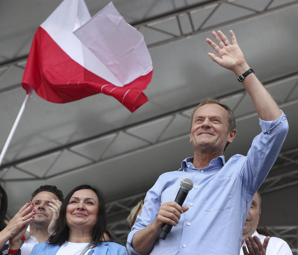 European Union Council President Donald Tusk leads a march celebrating Poland's 15 years in the EU and stressing the nation's attachment to the 28-member bloc ahead of May 26 key elections to the European Parliament, in Warsaw, Poland, Saturday, May 18, 2019.(AP Photo/Czarek Sokolowski)