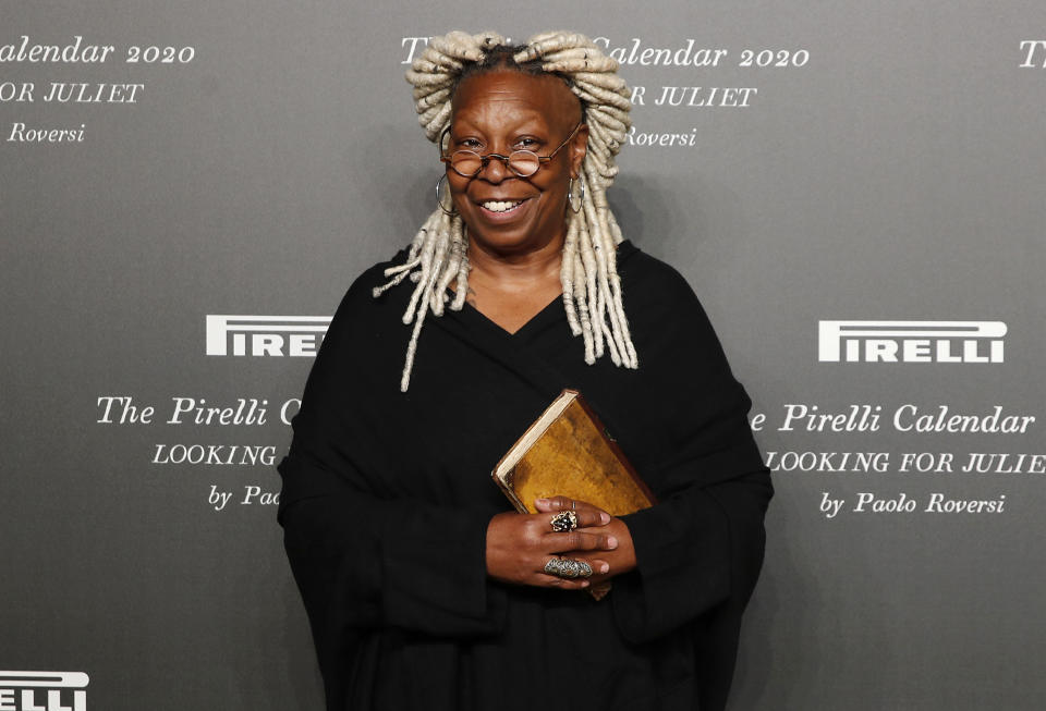 FILE - Whoopi Goldberg poses for photographers at the Pirelli Calendar event in Verona, Italy on Dec. 3, 2019. Goldberg turns 66 on Nov. 13. (AP Photo/Antonio Calanni, File)