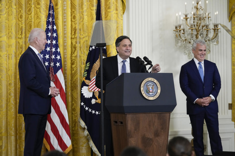 President Joe Biden applauds during an event to thank outgoing White House chief of staff Ron Klain, center, in the East Room of the White House in Washington, Wednesday, Feb. 1, 2023. At right is incoming chief of staff Jeff Zients. (AP Photo/Susan Walsh)