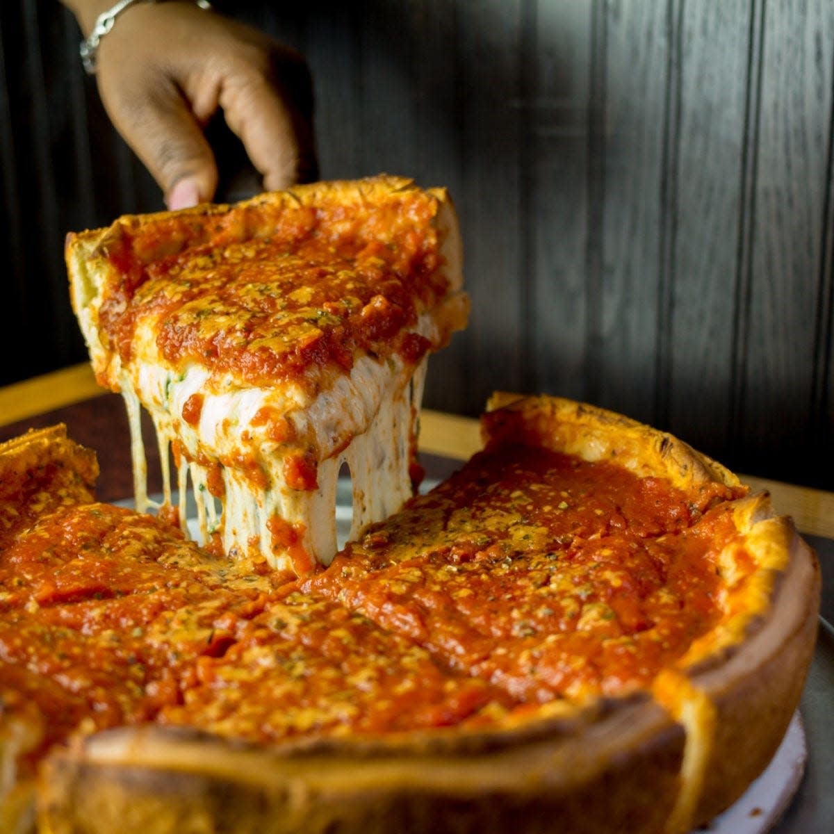 PizzaPapalis in Detroit has a great deep dish pizza in Greektown. Very good Chicago styled pizza.