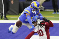 Los Angeles Rams cornerback Jalen Ramsey (20) defends a pass intended for Arizona Cardinals wide receiver DeAndre Hopkins (10) during the second half of an NFL football game in Inglewood, Calif., Sunday, Jan. 3, 2021. (AP Photo/Jae C. Hong)