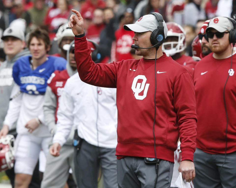 Oklahoma head coach Lincoln Riley gestures from the sidelines during an NCAA college football spring intrasquad game in Norman, Okla., Saturday, April 14, 2018. (AP Photo/Sue Ogrocki)