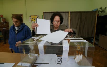 A woman votes in a polling station during parliamentary elections in Sofia, Bulgaria March 26, 2017. REUTERS/Laszlo Balogh