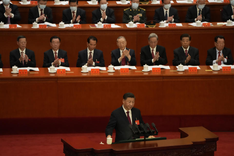 Chinese President Xi Jinping delivers a speech at the opening ceremony of the 20th National Congress of China's ruling Communist Party held at the Great Hall of the People in Beijing, China, Sunday, Oct. 16, 2022. China on Sunday opens a twice-a-decade party conference at which leader Xi Jinping is expected to receive a third five-year term that breaks with recent precedent and establishes himself as arguably the most powerful Chinese politician since Mao Zedong. (AP Photo/Mark Schiefelbein)