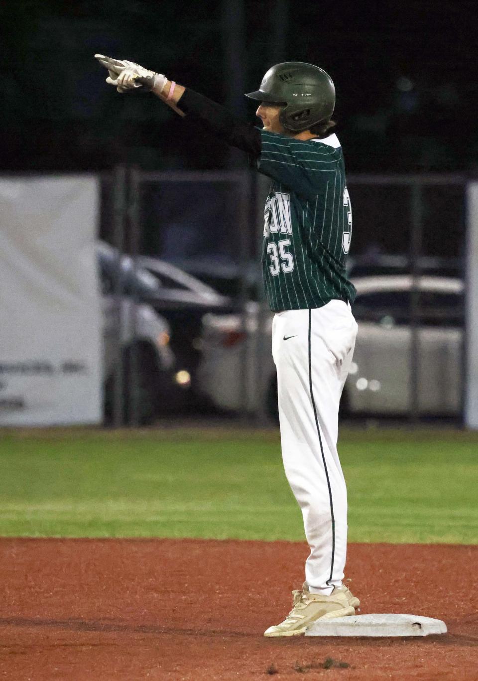 Abington's Henry Rogers celebrates his double during a game against Manchester-Essex at Fraser Field in Lynn on Tuesday, June 14, 2022.