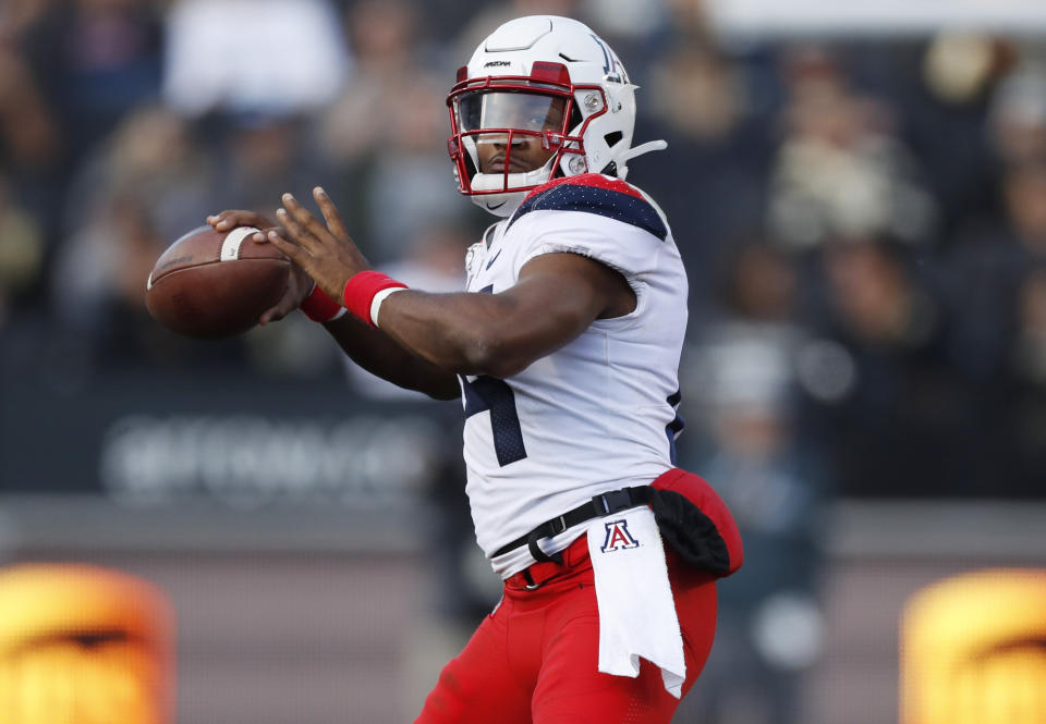 Arizona quarterback Khalil Tate throws a pass in the second half of an NCAA college football game against Colorado Saturday, Oct. 5, 2019, in Boulder, Colo. Arizona won 35-30. (AP Photo/David Zalubowski)