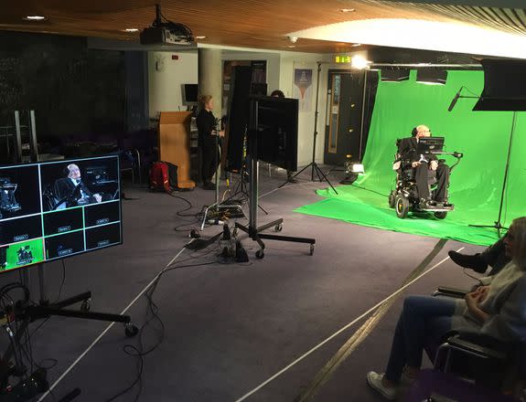 Hawking in front of a greenscreen.