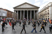 Tourists guides stage a protest in front of Rome's Pantheon, Tuesday, June 9, 2020, asking for government aid after more than three months of travel restriction due to coronavirus have canceled tourism throughout the country. (Cecilia Fabiano/LaPresse via AP)