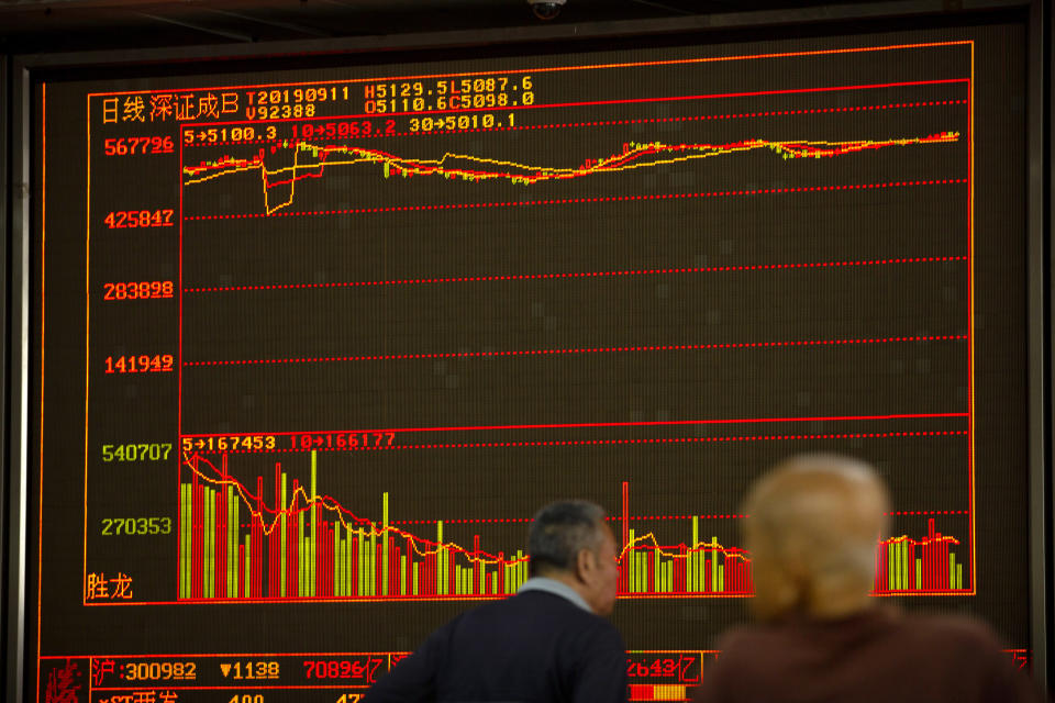Chinese investors monitor stock prices at a brokerage house in Beijing, Wednesday, Sept. 11, 2019. Asian shares were mostly higher Wednesday, cheered by a rise on Wall Street amid some signs of easing tensions between the U.S. and China on trade issues. (AP Photo/Mark Schiefelbein)