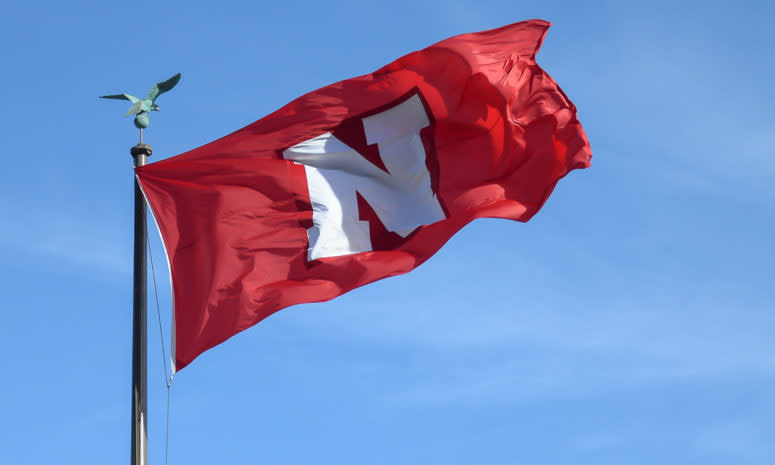 Nebraska's flag waves in the wind.