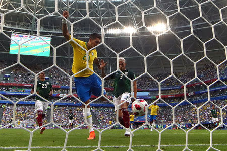 Soccer Football - World Cup - Round of 16 - Brazil vs Mexico - Samara Arena, Samara, Russia - July 2, 2018 Brazil's Roberto Firmino scores their second goal REUTERS/Michael Dalder