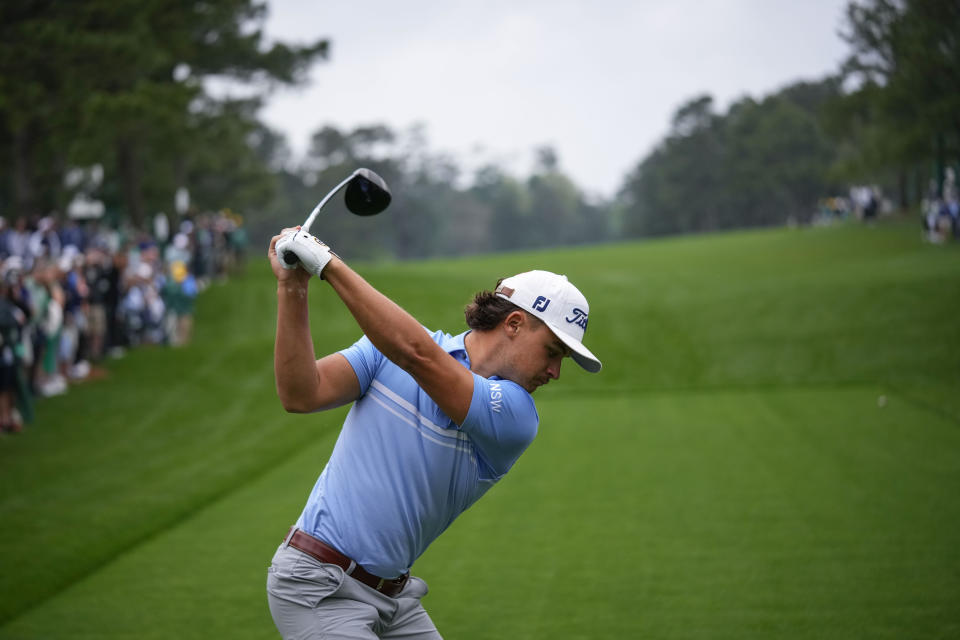 Harrison Crowe, of Australia, hits off the 15th tee during a practice for the Masters golf tournament at Augusta National Golf Club, Monday, April 3, 2023, in Augusta, Ga. (AP Photo/Matt Slocum)