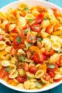 <p>This salad is the epitome of summer in a bowl.</p><p>Get the <a href="https://www.delish.com/uk/cooking/recipes/a32399230/bruschetta-pasta-salad-recipe/" rel="nofollow noopener" target="_blank" data-ylk="slk:Bruschetta Pasta Salad;elm:context_link;itc:0;sec:content-canvas" class="link ">Bruschetta Pasta Salad</a> recipe.</p>