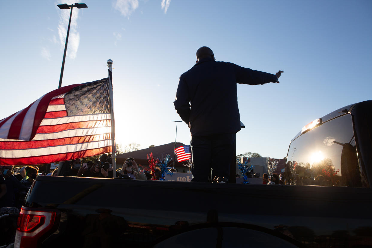 Georgia Democratic U.S. Senate candidate Raphael Warnock speaks to supporters during a rally on November 15, 2020 in Marietta, Georgia. (Photo by Jessica McGowan/Getty Images)                                                                                     