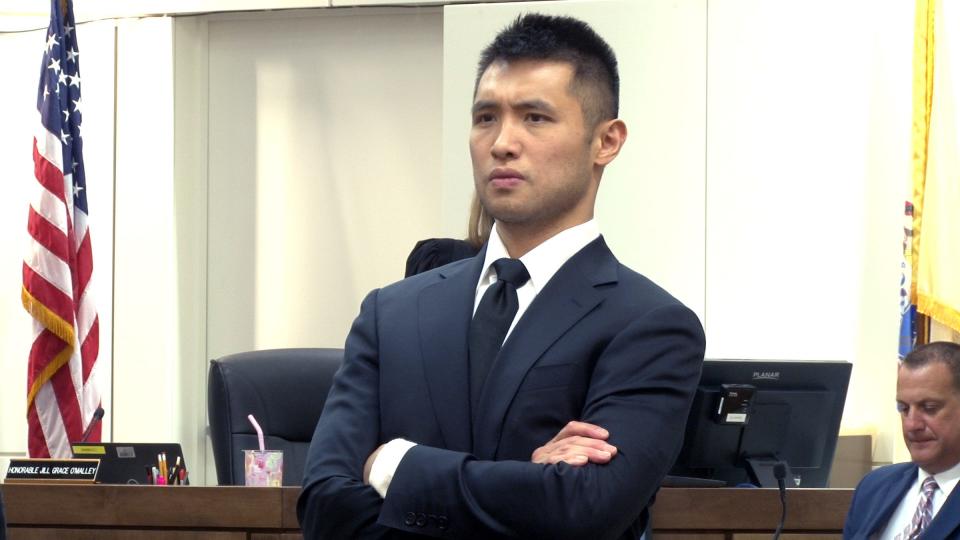 Terry Kuo looks back to the gallery at.the conclusion of the opening session of his retrial before Superior Court Judge Jill O'Malley at the Monmouth County Courthouse in Freehold Thursday, September 21, 2023. He is a former youth tennis instructor charged with child pornography and sexually assaulting an underaged student.