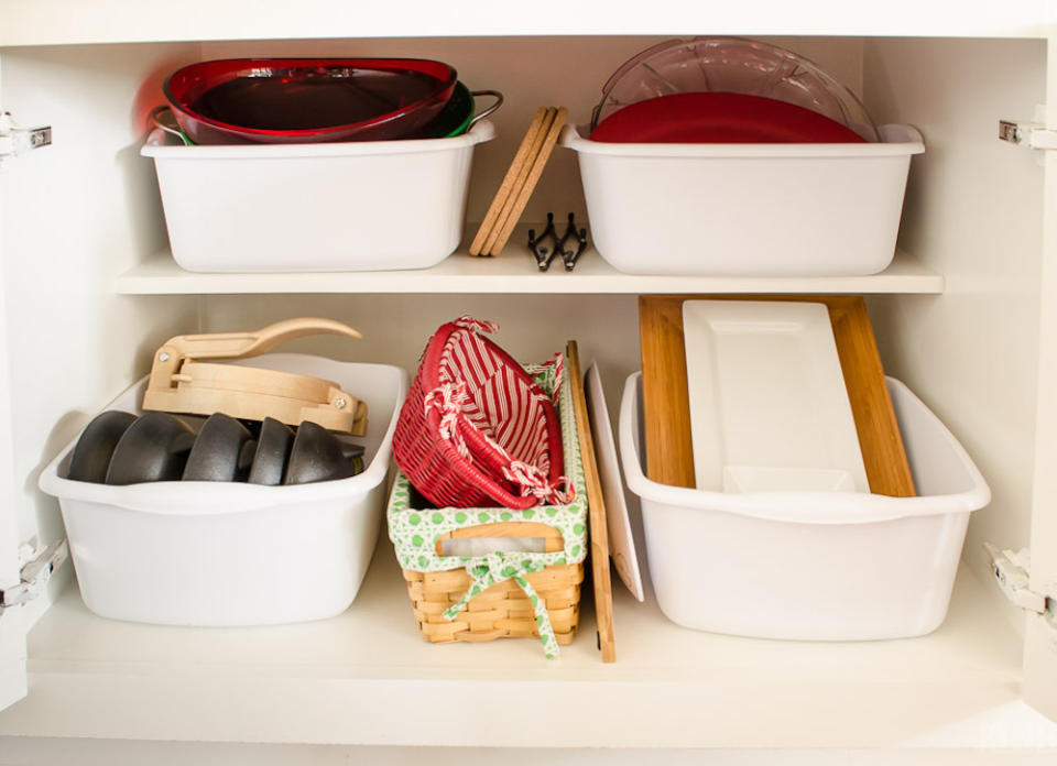 <body> <p>Left on shelves or in drawers, heavy kitchen essentials like <a rel="nofollow noopener" href=" http://www.bobvila.com/articles/how-to-season-cast-iron/?bv=yahoo" target="_blank" data-ylk="slk:cast-iron pans;elm:context_link;itc:0;sec:content-canvas" class="link ">cast-iron pans</a> and ceramics can topple over or even crush more fragile items in the vicinity. Stash them instead in bargain baskets and bins on the floor of a cabinet to keep them safe and secure—and out of sight.</p> <p><strong>Related: <a rel="nofollow noopener" href=" http://www.bobvila.com/slideshow/buy-or-diy-8-clever-solutions-for-storing-pots-and-pans-48450?bv=yahoo" target="_blank" data-ylk="slk:Buy or DIY: 8 Clever Solutions for Storing Pots and Pans;elm:context_link;itc:0;sec:content-canvas" class="link ">Buy or DIY: 8 Clever Solutions for Storing Pots and Pans</a> </strong> </p> </body>