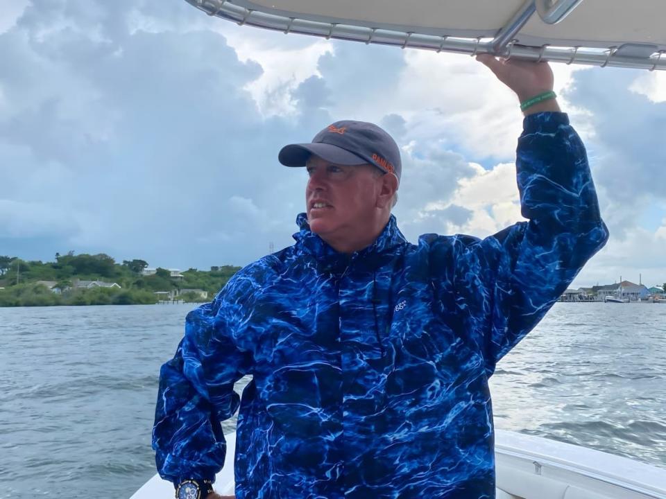 Byron Miller of Ocracoke Island, N.C., found a message in a bottle on a recent vacation to the Bahamas. The bottle was placed in the water in 2016 by a fishing crew from Nova Scotia. (Submitted by Byron Miller - image credit)