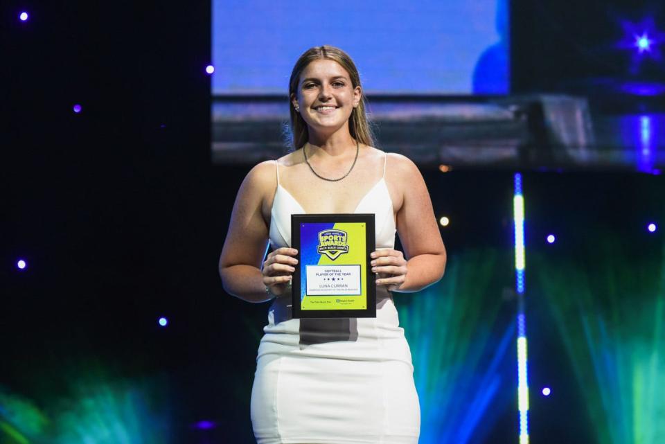 Luna Curran, accepting her plaque at last June's Palm Beach Post High School Sports Awards, was named the Girls High School Athlete of the Year by the Palm Beach County Sports Commission.