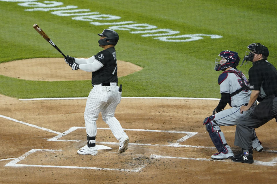 Chicago White Sox's Yermin Mercedes (73) hits a three-run home run against the Cleveland Indians during the first inning of a baseball game, Wednesday, April, 14, 2021, in Chicago. (AP Photo/David Banks)