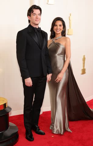 <p>Arturo Holmes/Getty</p> John Mulaney and Olivia Munn at the Oscars on March 10.