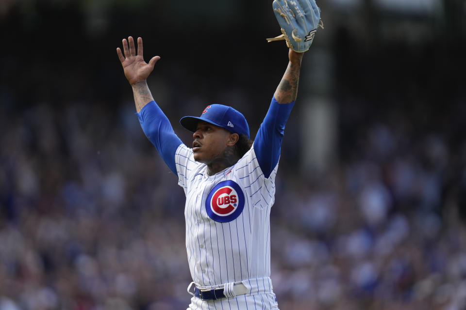 Chicago Cubs starting pitcher Marcus Stroman throws up his hands after pitching an entire baseball game against the Tampa Bay Rays, Monday, May 29, 2023, in Chicago. (AP Photo/Erin Hooley)