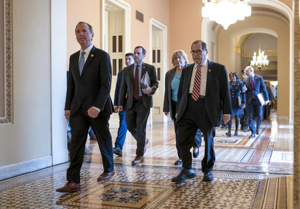 House Democratic impeachment managers, from left, House Intelligence Committee Chairman Adam Schiff, D-Calif., Rep. Jason Crow, D-Colo., Rep. Zoe Lofgren, D-Calif., and House Judiciary Committee Chairman Jerrold Nadler, D-N.Y., arrive for the start of the third day of the impeachment trial of President Donald Trump on charges of abuse of power and obstruction of Congress, at the Capitol in Washington, Thursday, Jan. 23, 2020. (AP Photo/J. Scott Applewhite)