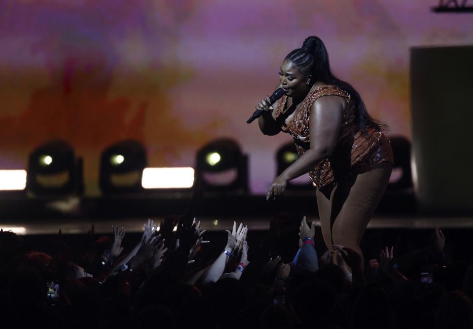 Lizzo performs on stage at the Brit Awards 2020 in London, Tuesday, Feb. 18, 2020. (Photo by Joel C Ryan/Invision/AP)