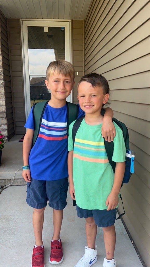 Jack and Austin Medina on their first day of school at Wequiock Elementary School on Sept. 5, 2023, in Green Bay. Jack is in third grade and Austin is in first.