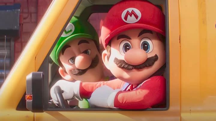 Luigi and Mario looking at the camera with unamused expressions in The Super Mario Bros. Movie.