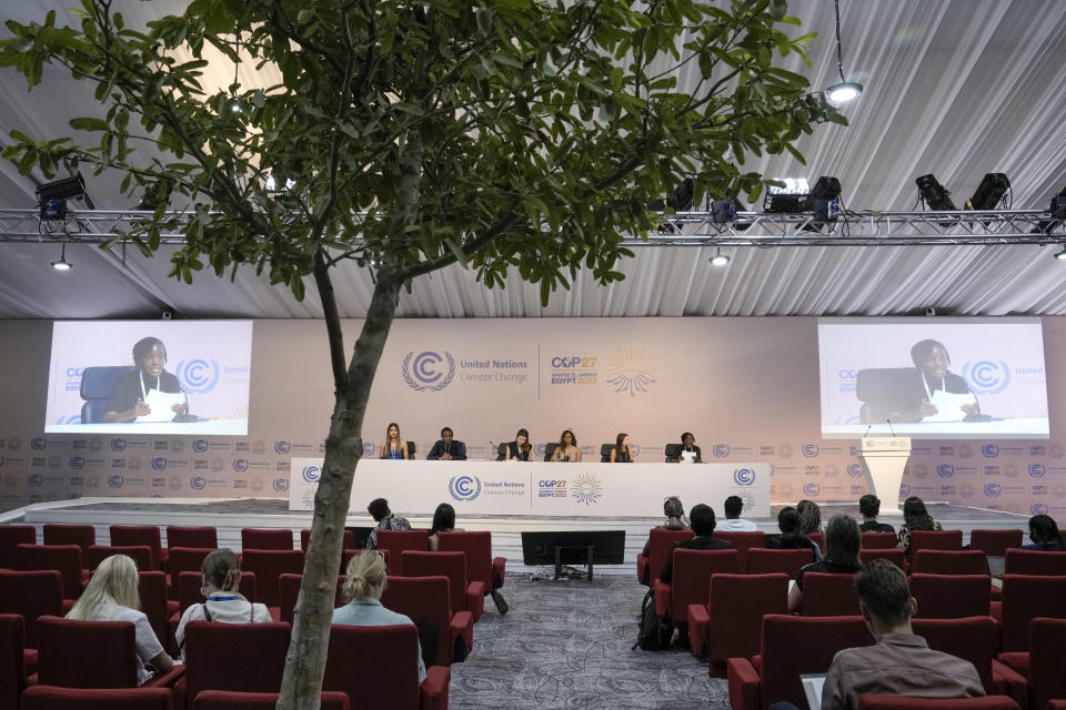 Vanessa Nakate, Ugandan climate activist, right, speaks on a panel with other activists, including from second right, Nicole Becker, of Argentina, Mitzi Jonelle Tan, of the Philippines, Luisa Neubauer, of Germany, Eric Njuguna, of Kenya, and Sophia Kianni, an Iranian-American environmentalist, at the COP27 U.N. Climate Summit, Wednesday, Nov. 9, 2022, in Sharm el-Sheikh, Egypt. (AP Photo/Nariman El-Mofty)