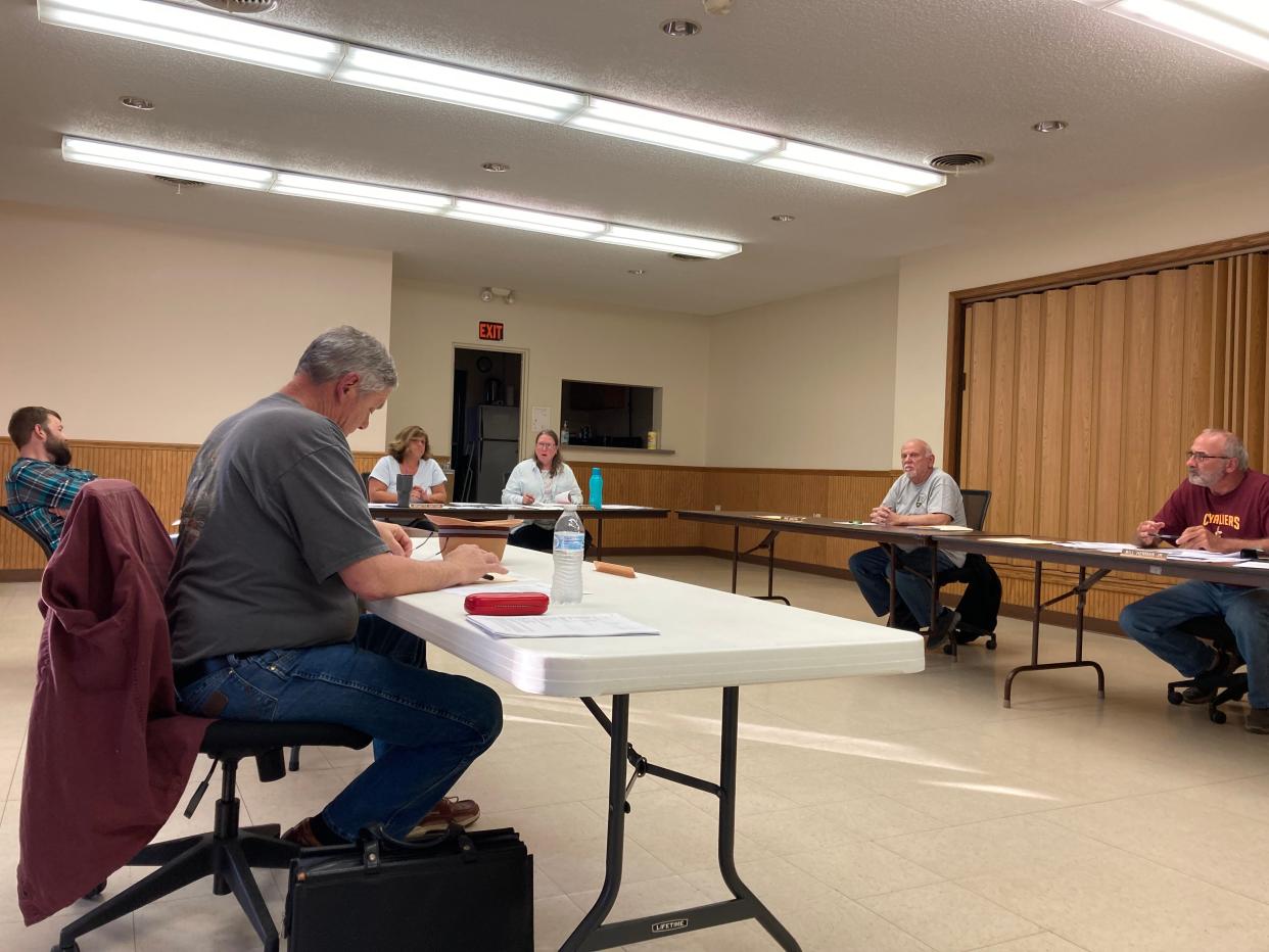 Perrysville councilmembers (left to right) Jimmy Goines, Lonnie Harris, Fiscal Officer Brigette Gatton, Mayor Heather Mullinnex Bob Zakutni and Bill Herman Jr begin Monday's meeting on May 3, 2022. Councilmembers Melissa Eggerton and David Artrip Jr. were not present.