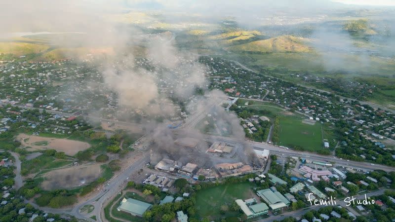 Aerial view shows burning buildings amid protests over a pay cut for police that officials blamed on an administrative glitch, in Port Moresby