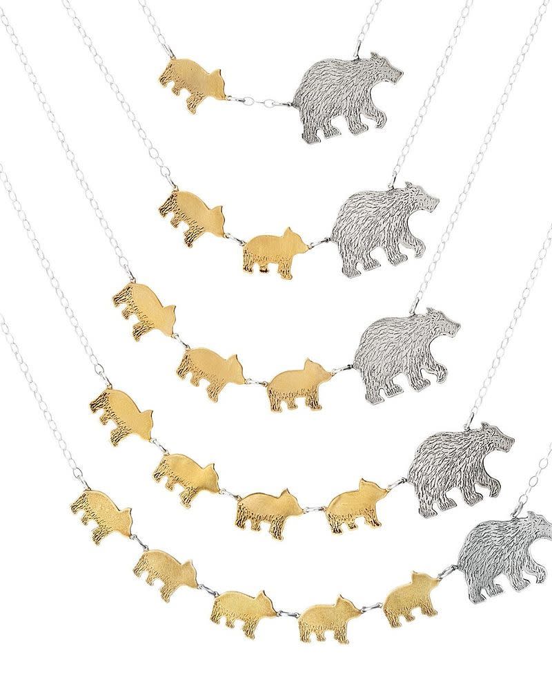 <p><a href="https://go.redirectingat.com?id=74968X1596630&url=https%3A%2F%2Fwww.uncommongoods.com%2Fproduct%2Fmama-bear-necklaces&sref=https%3A%2F%2Fwww.countryliving.com%2Fshopping%2Fgifts%2Fg1542%2Fchristmas-gifts-for-mom%2F" rel="nofollow noopener" target="_blank" data-ylk="slk:Shop Now;elm:context_link;itc:0;sec:content-canvas" class="link ">Shop Now</a></p><p>Mama Bear Necklaces</p><p>$130.00</p><p>uncommongoods.com</p><span class="copyright">Uncommon Goods</span>