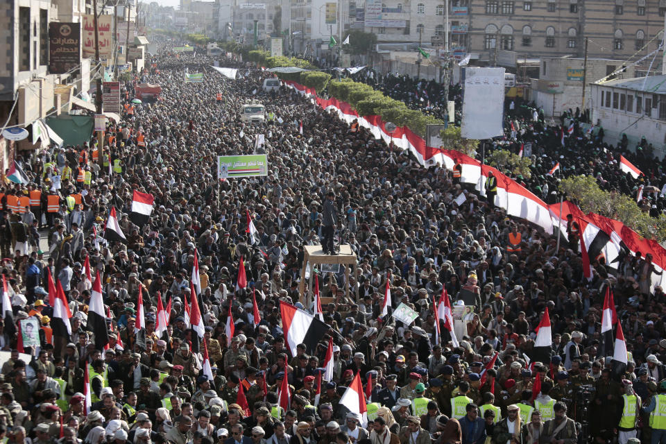 FILE - In this Dec. 5, 2017 file photo, supporters of Shiite Houthi rebels attend a rally in Sanaa, Yemen. In a statement Monday, Sept 24, 2018, Human Rights Watch accused the Houthis, of committing abuses including hostage taking, torture and enforced disappearances of people they hold in detention. HRW said United Arab Emirates forces, forces loyal to the UAE, and Yemeni government forces have also arbitrarily detained, tortured and forcibly disappeared scores of people in the Yemeni conflict. (AP Photo/Hani Mohammed, File)