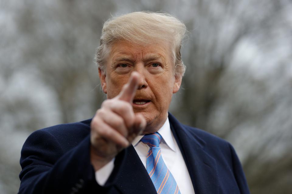 President Donald Trump speaks with reporters before boarding Marine One on the South Lawn of the White House, on April 5, 2019, in Washington.