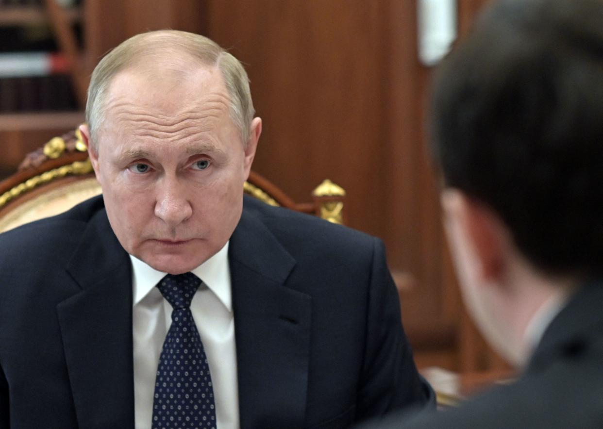 Russian President Vladimir Putin meets with Presidential Grants Foundation CEO Ilya Chukalin at the Kremlin in Moscow on March 29, 2022. (Photo by Mikhail KLIMENTYEV / SPUTNIK / AFP) (Photo by MIKHAIL KLIMENTYEV/SPUTNIK/AFP via Getty Images)