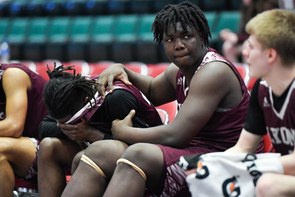 Lyons’ Jamire Johnson, right, consoles Jaheim Morris after their loss in a NYSPHSAA Class C Boys Basketball Championships semifinal in Glens Falls, N.Y., Friday, March 15, 2024. Lyons’ season ended with a 56-45 loss to Moravia-IV.