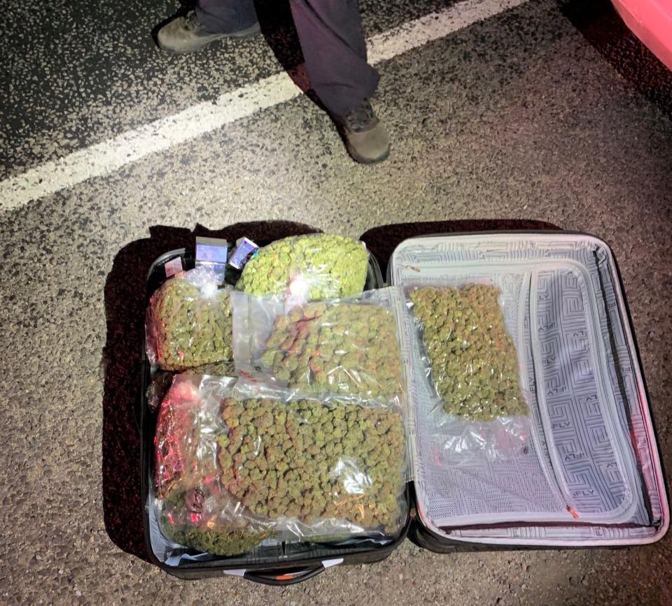 Sweetwater police said a Big Spring man was arrested during an Interstate 20 traffic stop early Thursday for having in a suit case more than 14 pounds of marijuana and more than 2 pounds of THC.