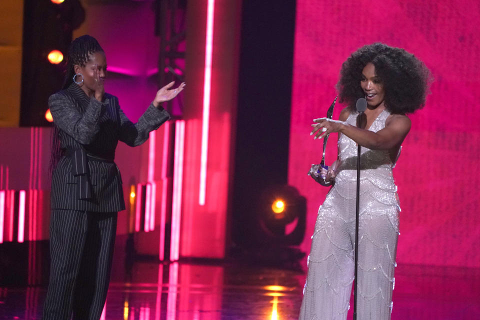 Regina King and Angela Bassett