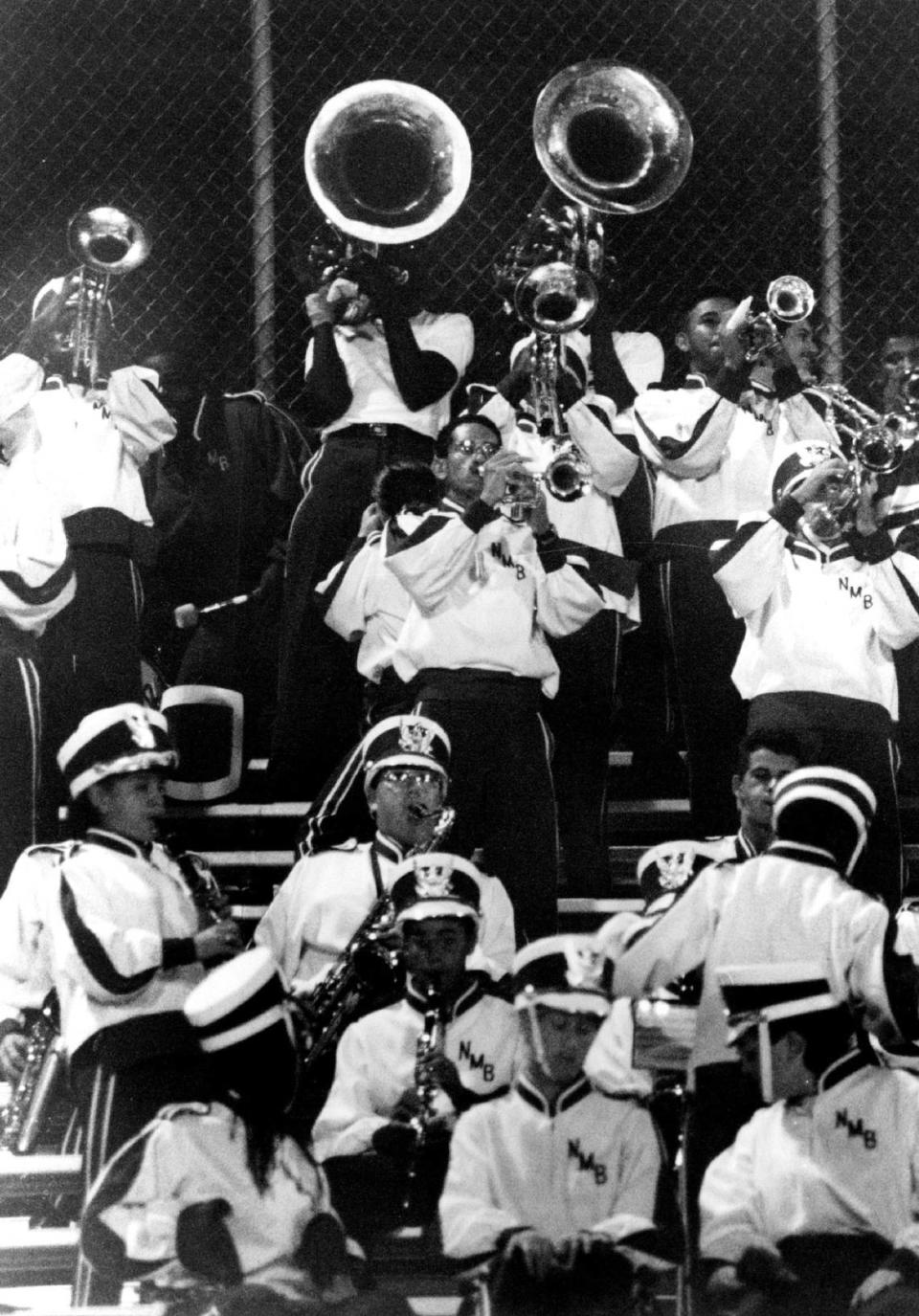 In 1993, members of the North Miami Beach Senior High School band play in the bleachers to get their team members and fans excited about the impending victory over North Miami Senior High. Hector Gabino/Miami Herald File