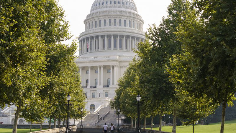 The Capitol is seen amid the haze and humidity of summer in Washington, Thursday, Aug. 26, 2021.