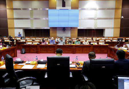 Facebook's Asia Pacific vice-president public policy Simon Milner, and Facebook's head of public policy in Indonesia Ruben Hattari, are seen at a public hearing and meeting at the Indonesian parliament on issues ranging from data protection to the oversight of content by the social media giant in Jakarta, Indonesia, April 17, 2018. REUTERS/Willy Kurniawan