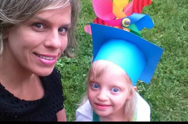 Heather and Lucy at her daycare graduation ceremony.