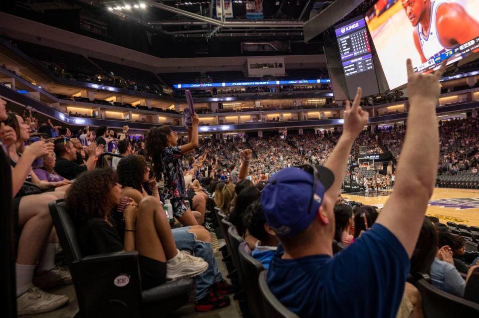 Sacramento Kings fans cheer at Golden 1 Center during the Game 6 watch party for the first-round NBA playoff series against the Golden State Warriors at Chase Center in San Francisco on Friday.