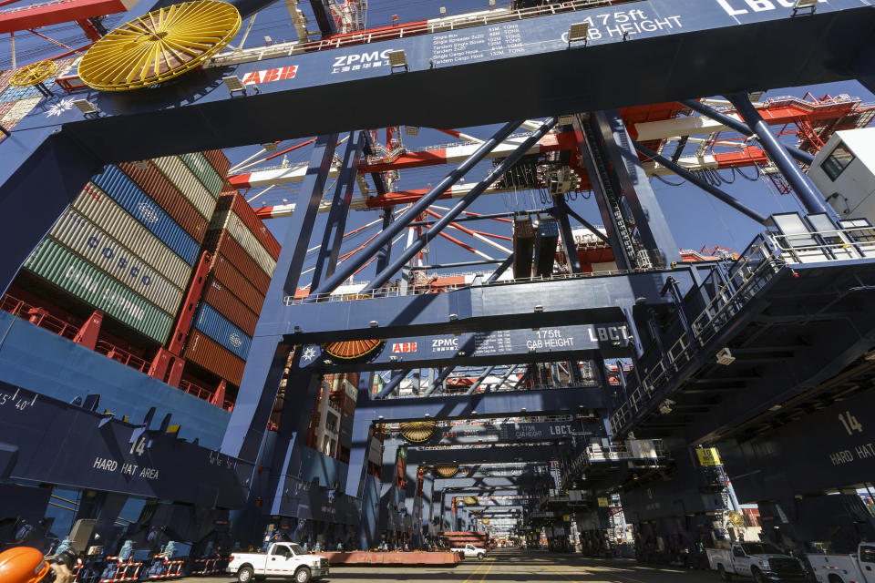 Rows of ship-to-shore gantry cranes, made by Chinese manufacturer ZPMC, are seen at the Long Beach Container Terminal at Middle Harbor in the Port of Long Beach, Calif., Feb. 9, 2023. / Credit: Damian Dovarganes/AP