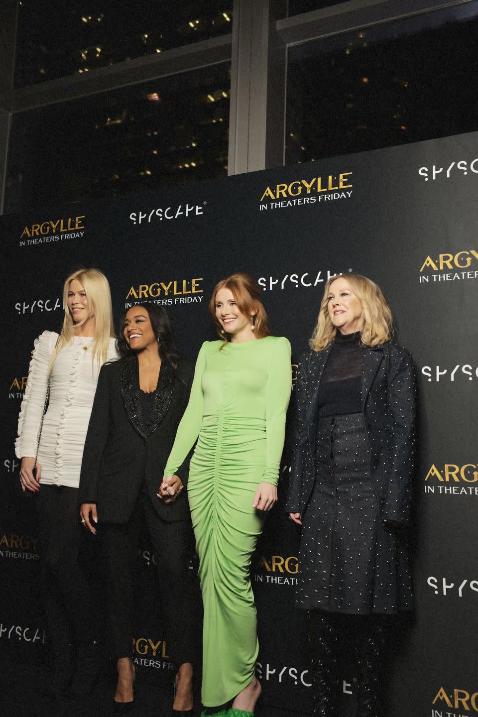 a group of women posing for a photo