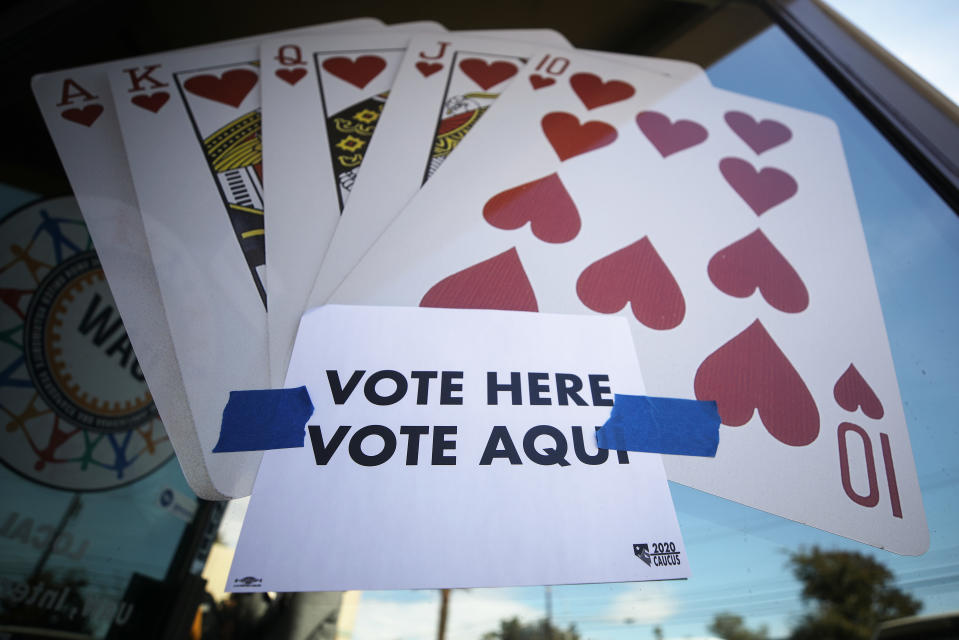 A "Vote Here" sign is posted on the final day of early voting in the Nevada caucuses in Las Vegas on Tuesday. (Photo by Mario Tama/Getty Images)